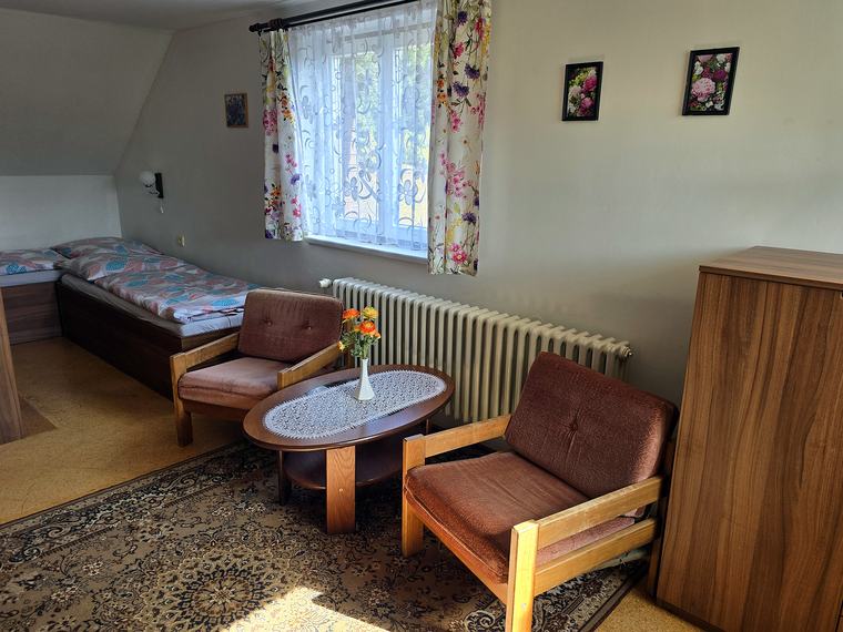 Podkrovná izba s posedením v chate Rekrea